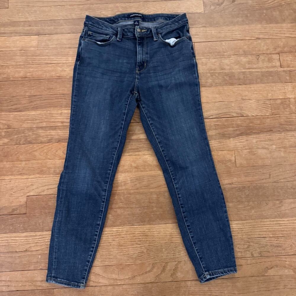 Calvin Klein dark wash mid rise skinny ankle jeans size 10
b73
